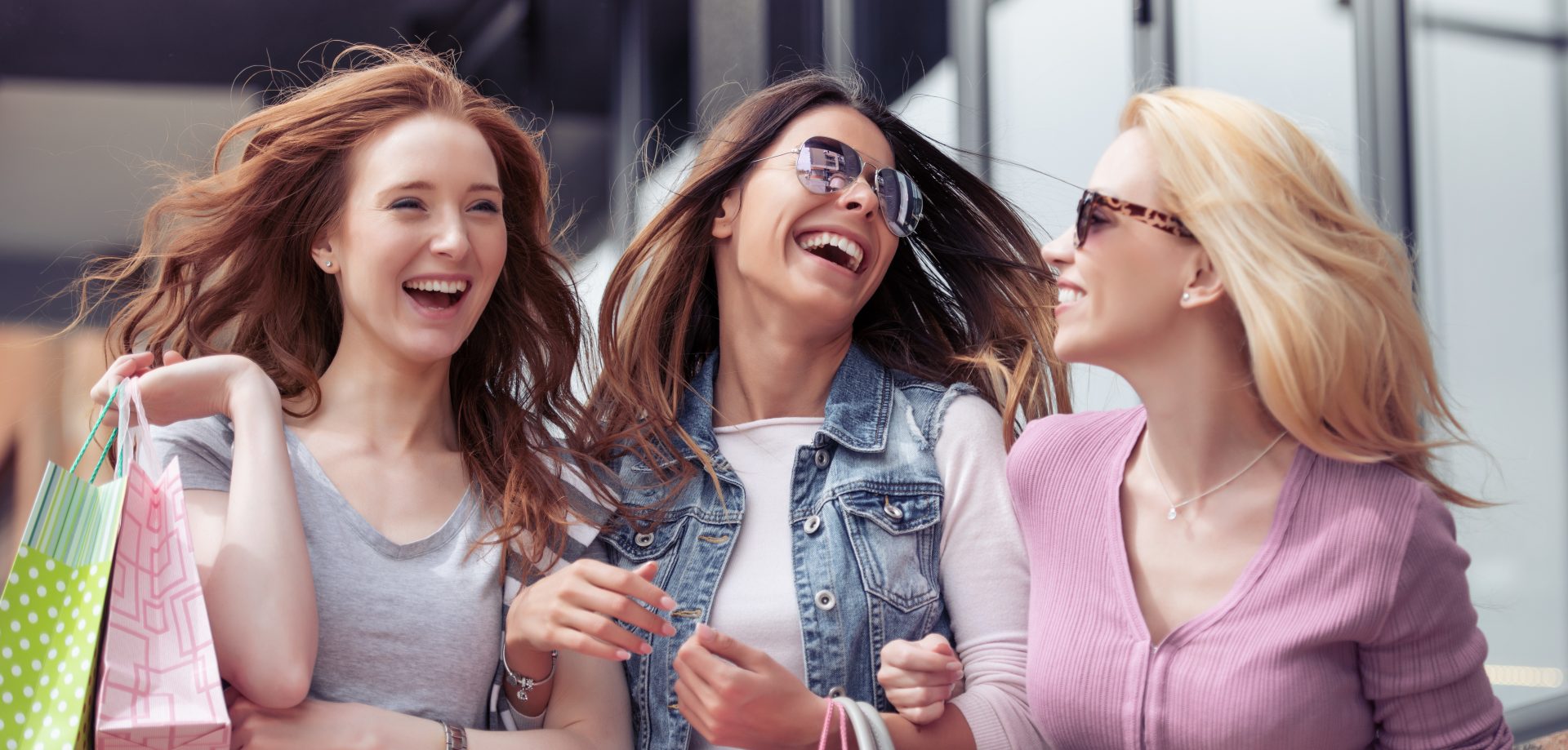 Young women with shopping bags in the city